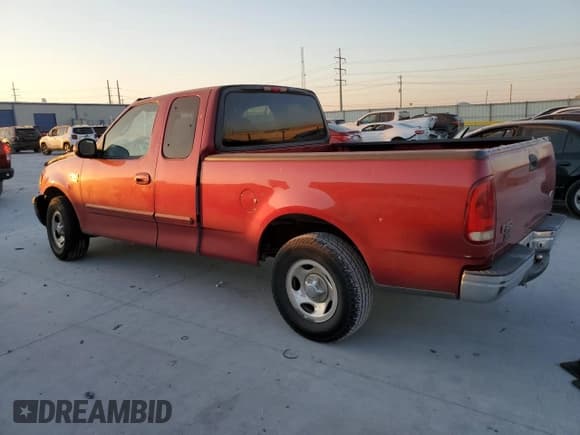✅ 2001 Ford F-150 XL • VIN: 1FTRX17WX1KC66652 • Lot: 82570695. Listed on Copart with Not provided. Free auction sales archive from the USA and detailed vehicle history report at DreamBid. Image 2.