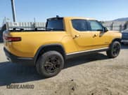 ✅ 2023 Rivian R1T Adventure • VIN: 7FCTGAAA8PN022857 • Lot: 63064315. Listed on Copart with 40,379 mi. Free auction sales archive from the USA and detailed vehicle history report at DreamBid. Image 3.