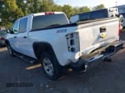 ✅ 2014 Chevrolet Silverado 1500 LT • VIN: 3GCUKREC0EG477856 • Лот: 43223789. Опубликован ранее на IAAI с пробегом 212 142 миль. Бесплатный доступ к архиву аукционных продаж из США и подробный отчёт об истории автомобиля на DreamBid. Изображение 3.