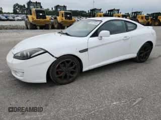 2007 Hyundai Tiburon GT с VIN KMHHN66F47U249354, выставлен на аукционе Copart как лот 69979965 с пробегом 168 813 миль миль и Списание • Salvage title. История ставок и продаж доступна на DreamBid. Изображение 1.