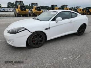 2007 Hyundai Tiburon GT с VIN KMHHN66F47U249354, выставлен на аукционе Copart как лот 69979965 с пробегом 168 813 миль миль и Списание • Salvage title. История ставок и продаж доступна на DreamBid. Изображение 1.