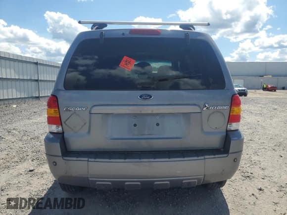 ✅ 2007 Ford Escape Hybrid • VIN: 1FMCU49H07KB60889 • Lot: 71118925. Wystawiony na Copart z przebiegiem 99 990 mil. Bezpłatny archiwum sprzedaży aukcyjnych z USA i szczegółowy raport historii pojazdu na DreamBid. Zdjęcie 6.