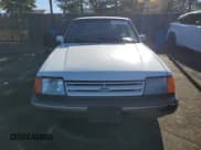 ✅ 1989 Ford Escort • VIN: 1FAPP9090KW279114 • Lot: 83614994. Wystawiony na Copart z przebiegiem 60 585 mil. Bezpłatny archiwum sprzedaży aukcyjnych z USA i szczegółowy raport historii pojazdu na DreamBid. Zdjęcie 5.