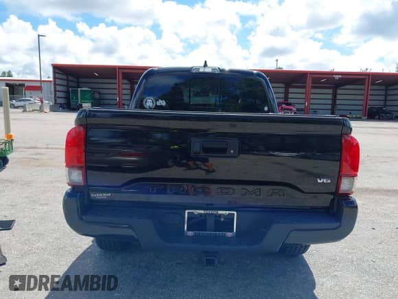 2022 Toyota Tacoma SR5 with VIN 3TMAZ5CN4NM164094, listed as a IAAI auction lot 43409274 with 38,585 mi miles and . Bid and sale history available at DreamBid. Image 16.