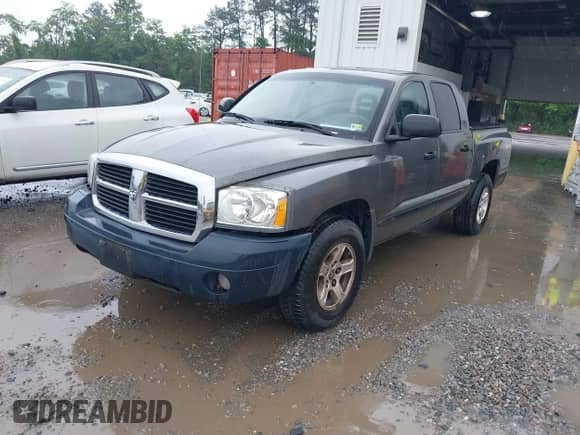 2007 Dodge Dakota SLT with VIN 1D7HW48K17S129383, listed as a IAAI auction lot 42253930 with 164,430 mi miles and . Bid and sale history available at DreamBid. Image 2.