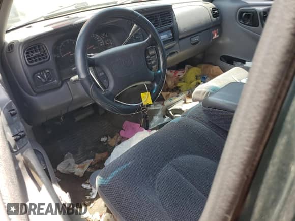 1999 Dodge Dakota SLT z VIN 1B7GL22X0XS145128, wystawiony jako Copart lot #64959364 z przebiegiem 96 047 mil mil oraz Szkoda całkowita • Salvage title. Historia ofert i sprzedaży dostępna na DreamBid. Obrazek 8.