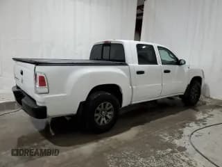 ✅ 2007 Mitsubishi Raider LS • VIN: 1Z7HC28K97S213463 • Лот: 70314894. Опубликован ранее на Copart с пробегом 155 970 миль. Бесплатный доступ к архиву аукционных продаж из США и подробный отчёт об истории автомобиля на DreamBid. Изображение 3.