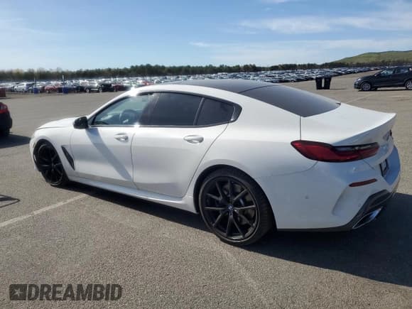 ✅ 2022 BMW 8 Series 840i • VIN: WBAGV2C0XNCG97478 • Лот: 55045765. Опубликован ранее на Copart с пробегом 31 268 миль. Бесплатный доступ к архиву аукционных продаж из США и подробный отчёт об истории автомобиля на DreamBid. Изображение 2.