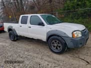 ✅ 2002 Nissan Frontier SE • VIN: 1N6ED29X02C352919 • Lot: 94635395. Listed on Copart with 149,510 mi. Free auction sales archive from the USA and detailed vehicle history report at DreamBid. Image 4.