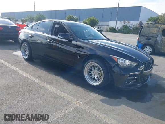 ✅ 2015 Infiniti Q50 Premium • VIN: JN1BV7AP2FM353956 • Lot: 43582313. Listed on IAAI with 123,573 mi. Free auction sales archive from the USA and detailed vehicle history report at DreamBid. Image 1.