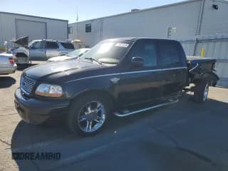 ✅ 2003 Ford F-150 Harley-Davidson • VIN: 1FTRW07383KC33025 • Lot: 90401515. Listed on Copart with 105,412 mi. Free auction sales archive from the USA and detailed vehicle history report at DreamBid. Image 1.