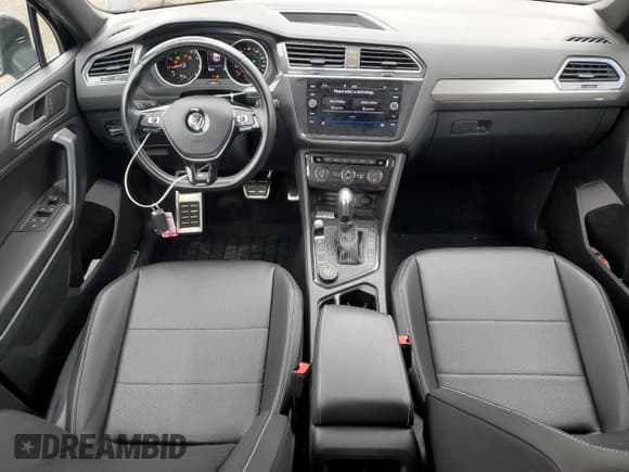 ✅ 2021 Volkswagen Tiguan SE • VIN: 3VV2B7AX1MM067735 • Lot: 86079125. Listed on Copart with 83,584 mi. Free auction sales archive from the USA and detailed vehicle history report at DreamBid. Image 8.