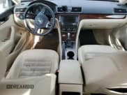 ✅ 2013 Volkswagen Passat SEL • VIN: 1VWCP7A30DC068276 • Lot: 80512125. Listed on Copart with 133,172 mi. Free auction sales archive from the USA and detailed vehicle history report at DreamBid. Image 8.