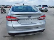 ✅ 2017 Ford Fusion Titanium • VIN: 3FA6P0K93HR114612 • Lot: 43284409. Listed on IAAI with 88,489 mi. Free auction sales archive from the USA and detailed vehicle history report at DreamBid. Image 16.