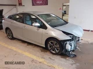 2021 Toyota Prius L Eco with VIN JTDKAMFU4M3147210, listed as a IAAI auction lot 42437023 with 12,673 mi miles and . Bid and sale history available at DreamBid. Image 1.