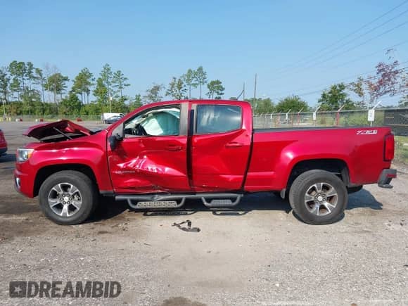 2015 Chevrolet Colorado 4WD Z71 z VIN 1GCGTCE35F1168116, wystawiony jako IAAI lot #43267090 z przebiegiem 185 667 mil mil oraz . Historia ofert i sprzedaży dostępna na DreamBid. Obrazek 14.