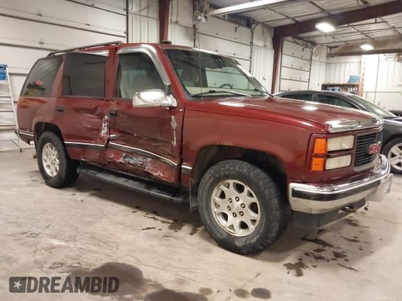 ✅ 1999 GMC Yukon • VIN: 1GKEK13R3XJ700930 • Lot: 40915481. Wystawiony na IAAI z przebiegiem 249 773 mil. Bezpłatny archiwum sprzedaży aukcyjnych z USA i szczegółowy raport historii pojazdu na DreamBid. Zdjęcie 1.