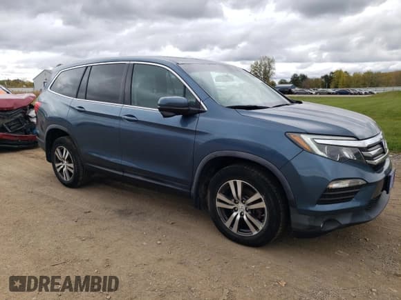 ✅ 2017 Honda Pilot EX-L • VIN: 5FNYF6H72HB023699 • Lot: 82439425. Listed on Copart with 63,725 mi. Free auction sales archive from the USA and detailed vehicle history report at DreamBid. Image 4.