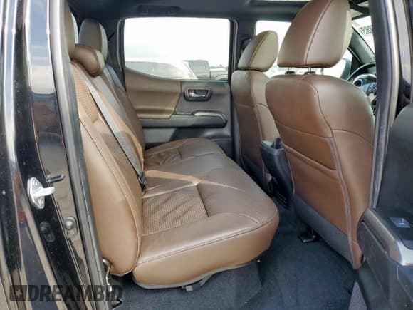 ✅ 2023 Toyota Tacoma Limited • VIN: 3TMEZ5CN3PM200460 • Лот: 93877885. Опубликован ранее на Copart с пробегом 59 605 миль. Бесплатный доступ к архиву аукционных продаж из США и подробный отчёт об истории автомобиля на DreamBid. Изображение 10.