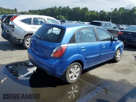✅ 2010 Kia Rio LX • VIN: KNADH5A37A6651217 • Lot: 65018164. Listed on Copart with 100,791 mi. Free auction sales archive from the USA and detailed vehicle history report at DreamBid. Image 3.