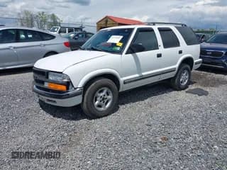 ✅ 1999 Chevrolet Blazer LS • VIN: 1GNDT13W5X2143627 • Lot: 42171552. Wystawiony na IAAI z przebiegiem 168 303 mil. Bezpłatny archiwum sprzedaży aukcyjnych z USA i szczegółowy raport historii pojazdu na DreamBid. Zdjęcie 2.