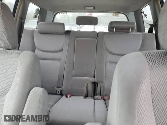 2003 Toyota Highlander z VIN JTEGD21A830058329, wystawiony jako Copart lot #69748265 z przebiegiem 221 228 mil mil oraz Czysty tytuł • Clean title. Historia ofert i sprzedaży dostępna na DreamBid. Obrazek 10.