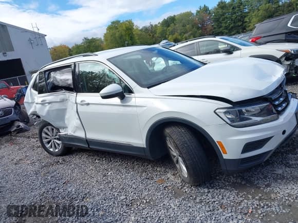 ✅ 2018 Volkswagen Tiguan SEL • VIN: 3VV2B7AX4JM071743 • Лот: 43466984. Опубликован ранее на IAAI с пробегом 90 095 миль. Бесплатный доступ к архиву аукционных продаж из США и подробный отчёт об истории автомобиля на DreamBid. Изображение 13.