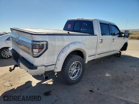 ✅ 2014 Ford F-150 Platinum • VIN: 1FTFW1ETXEFB69464 • Lot: 90674705. Listed on Copart with 156,292 mi. Free auction sales archive from the USA and detailed vehicle history report at DreamBid. Image 3.