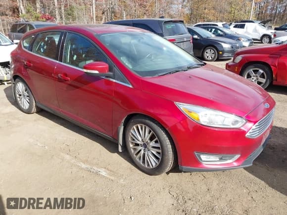 ✅ 2016 Ford Focus Titanium • VIN: 1FADP3N29GL318464 • Lot: 43623140. Wystawiony na IAAI z przebiegiem 144 650 mil. Bezpłatny archiwum sprzedaży aukcyjnych z USA i szczegółowy raport historii pojazdu na DreamBid. Zdjęcie 1.