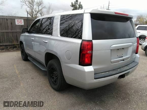 2016 Chevrolet Tahoe Commercial with VIN 1GNSKDEC5GR368328, listed as a IAAI auction lot 41975629 with 104,205 mi miles and . Bid and sale history available at DreamBid. Image 3.