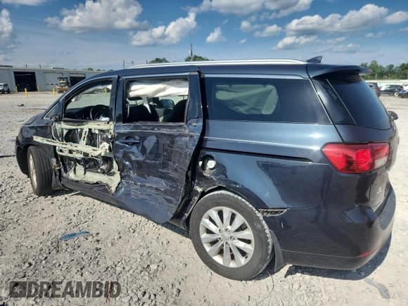 ✅ 2016 Kia Sedona EX • VIN: KNDMC5C18G6137270 • Lot: 65740325. Wystawiony na Copart z przebiegiem 99 190 mil. Bezpłatny archiwum sprzedaży aukcyjnych z USA i szczegółowy raport historii pojazdu na DreamBid. Zdjęcie 2.