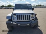 ✅ 2014 Jeep Wrangler Unlimited Sahara • VIN: 1C4BJWEG9EL108847 • Lot: 70563165. Wystawiony na Copart z przebiegiem 172 316 mil. Bezpłatny archiwum sprzedaży aukcyjnych z USA i szczegółowy raport historii pojazdu na DreamBid. Zdjęcie 5.
