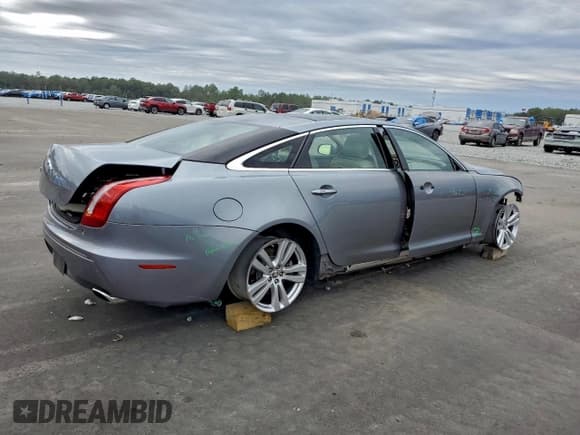 ✅ 2011 Jaguar XJ XJL • VIN: SAJWA2GB5BLV06954 • Lot: 94596825. Listed on Copart with 115,082 mi. Free auction sales archive from the USA and detailed vehicle history report at DreamBid. Image 3.