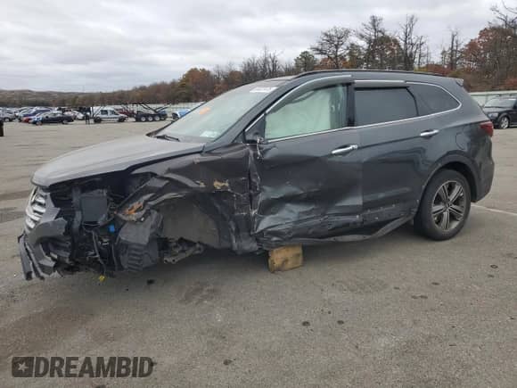 2013 Hyundai Santa Fe Limited с VIN KM8SRDHF9DU010051, выставлен на аукционе Copart как лот 90327475 с пробегом Не указан миль и Списание • Salvage title. История ставок и продаж доступна на DreamBid. Изображение 1.