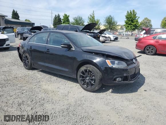 ✅ 2014 Volkswagen Jetta TDI w/Premium/Nav • VIN: 3VWLL7AJXEM354100 • Lot: 61046365. Listed on Copart with 111,699 mi. Free auction sales archive from the USA and detailed vehicle history report at DreamBid. Image 4.