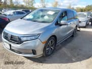 ✅ 2021 Honda Odyssey Touring • VIN: 5FNRL6H85MB042750 • Lot: 43439314. Listed on IAAI with 97,703 mi. Free auction sales archive from the USA and detailed vehicle history report at DreamBid. Image 2.