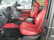 ✅ 2003 Mercedes-Benz G 500 • VIN: WDCYR49E03X136505 • Lot: 70095935. Wystawiony na Copart z przebiegiem 223 455 mil. Bezpłatny archiwum sprzedaży aukcyjnych z USA i szczegółowy raport historii pojazdu na DreamBid. Zdjęcie 7.