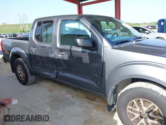 ✅ 2019 Nissan Frontier SV • VIN: 1N6AD0EV8KN752321 • Lot: 42424113. Listed on IAAI with 123,729 mi. Free auction sales archive from the USA and detailed vehicle history report at DreamBid. Image 6.