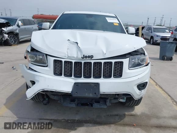 ✅ 2015 Jeep Grand Cherokee Laredo • VIN: 1C4RJEAG7FC104893 • Lot: 43009030. Listed on IAAI with 128,500 mi. Free auction sales archive from the USA and detailed vehicle history report at DreamBid. Image 13.