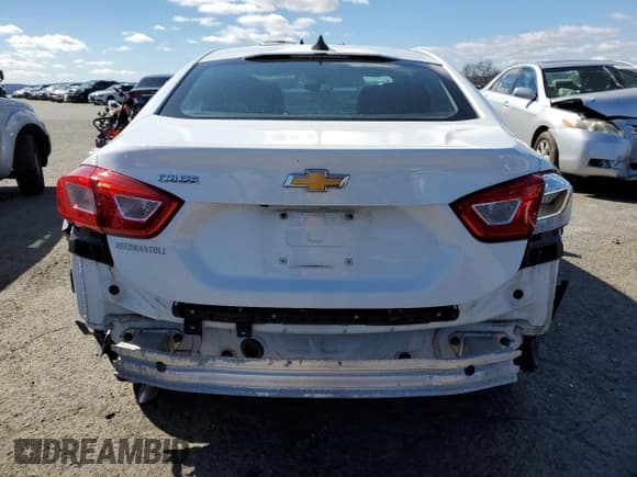 ✅ 2018 Chevrolet Cruze LS • VIN: 1G1BC5SM1J7227535 • Lot: 43744573. Listed on Copart with Not provided. Free auction sales archive from the USA and detailed vehicle history report at DreamBid. Image 6.