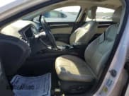 ✅ 2014 Ford Fusion Titanium Hybrid • VIN: 3FA6P0RU0ER390879 • Лот: 80521025. Опубликован ранее на Copart с пробегом 221 247 миль. Бесплатный доступ к архиву аукционных продаж из США и подробный отчёт об истории автомобиля на DreamBid. Изображение 7.