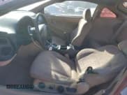 ✅ 1999 Mitsubishi Eclipse RS • VIN: 4A3AK34Y2XE114107 • Лот: 50141765. Опубликован ранее на Copart с пробегом 201 973 миль. Бесплатный доступ к архиву аукционных продаж из США и подробный отчёт об истории автомобиля на DreamBid. Изображение 7.