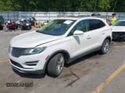 ✅ 2016 Lincoln MKC Select • VIN: 5LMTJ2DH9GUJ12832 • Lot: 42924982. Listed on IAAI with 124,059 mi. Free auction sales archive from the USA and detailed vehicle history report at DreamBid. Image 2.