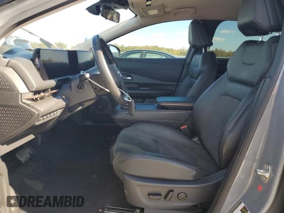 ✅ 2023 Nissan ARIYA Engage • VIN: JN1AF0BA6PM406105 • Lot: 87304785. Wystawiony na Copart z przebiegiem 47 407 mil. Bezpłatny archiwum sprzedaży aukcyjnych z USA i szczegółowy raport historii pojazdu na DreamBid. Zdjęcie 7.