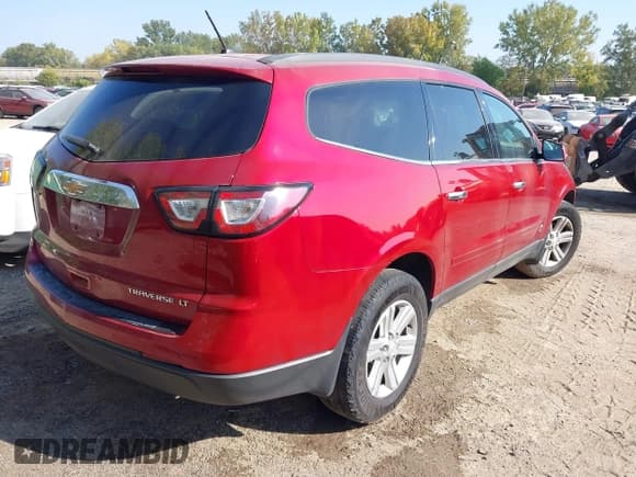 ✅ 2014 Chevrolet Traverse LT • VIN: 1GNKRHKD1EJ170566 • Lot: 43122514. Listed on IAAI with 197,399 mi. Free auction sales archive from the USA and detailed vehicle history report at DreamBid. Image 4.
