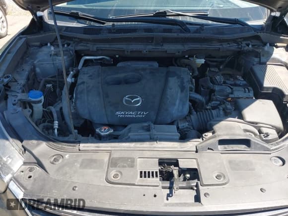 ✅ 2016 Mazda CX-5 Grand Touring • VIN: JM3KE4DY3G0912088 • Lot: 42203530. Wystawiony na IAAI z przebiegiem 86 914 mil. Bezpłatny archiwum sprzedaży aukcyjnych z USA i szczegółowy raport historii pojazdu na DreamBid. Zdjęcie 10.