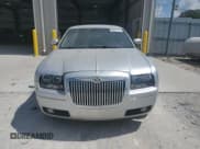 ✅ 2006 Chrysler 300 Touring • VIN: 2C3KK53G66H480868 • Лот: 69476715. Опубликован ранее на Copart с пробегом 141 578 миль. Бесплатный доступ к архиву аукционных продаж из США и подробный отчёт об истории автомобиля на DreamBid. Изображение 5.