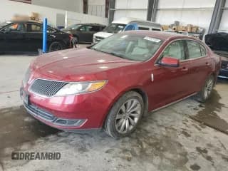 ✅ 2015 Lincoln MKS • VIN: 1LNHL9DKXFG605763 • Lot: 67432155. Wystawiony na Copart z przebiegiem 102 529 mil. Bezpłatny archiwum sprzedaży aukcyjnych z USA i szczegółowy raport historii pojazdu na DreamBid. Zdjęcie 1.