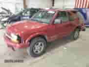 1999 Chevrolet Blazer LS z VIN 1GNCT18W7XK193241, wystawiony jako Copart lot #69390194 z przebiegiem 188 720 mil mil oraz Czysty tytuł • Clean title. Historia ofert i sprzedaży dostępna na DreamBid. Obrazek 1.