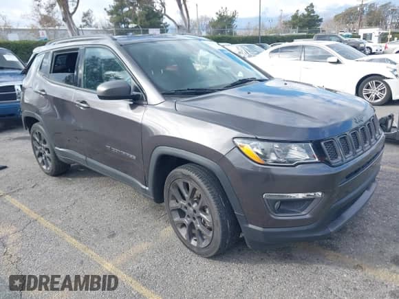 2021 Jeep Compass 80th Anniversary z VIN 3C4NJCEB7MT596909, wystawiony jako IAAI lot #41376547 z przebiegiem 54 058 mil mil oraz . Historia ofert i sprzedaży dostępna na DreamBid. Obrazek 1.